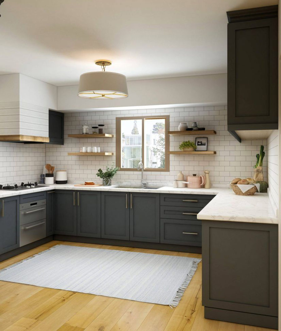 Tủ tối màu kết hợp cùng mặt bàn màu trắng mang lại nét thẩm mỹ cao cho căn bếp nhà bạn.